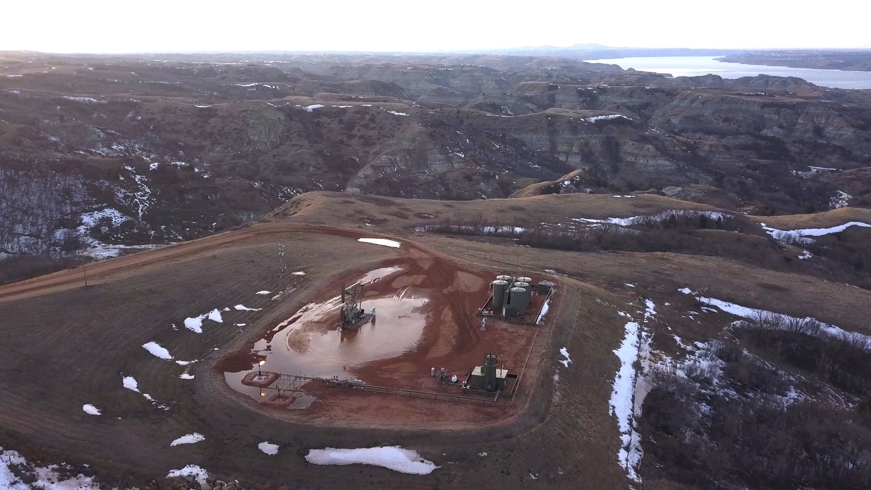 Oil well in the North Dakota Badlands on lands of the MHA Nation, March 2019.  Photo: Angela Anderson